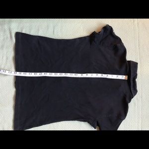 Black collared jersey with snaps